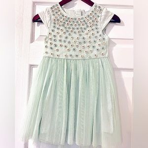 Girls Fancy Dress with embellished floral detail and tutu skirt. Size 7yrs.